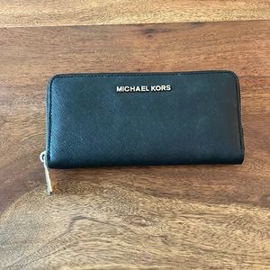 Michael Kors zip around large leather black wallet